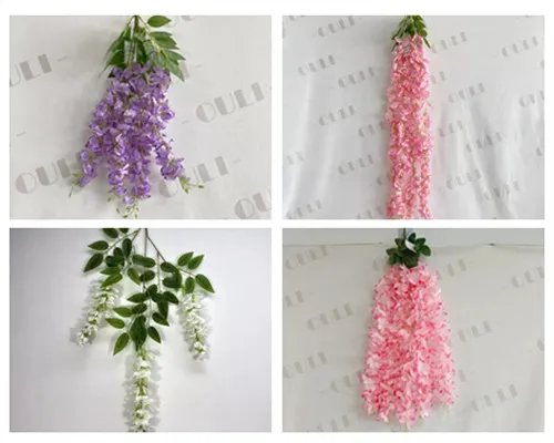 Keinotekoiset Wisteria -haarat vs. viiniköynnökset - mikä ero ja miten niitä käytetään?